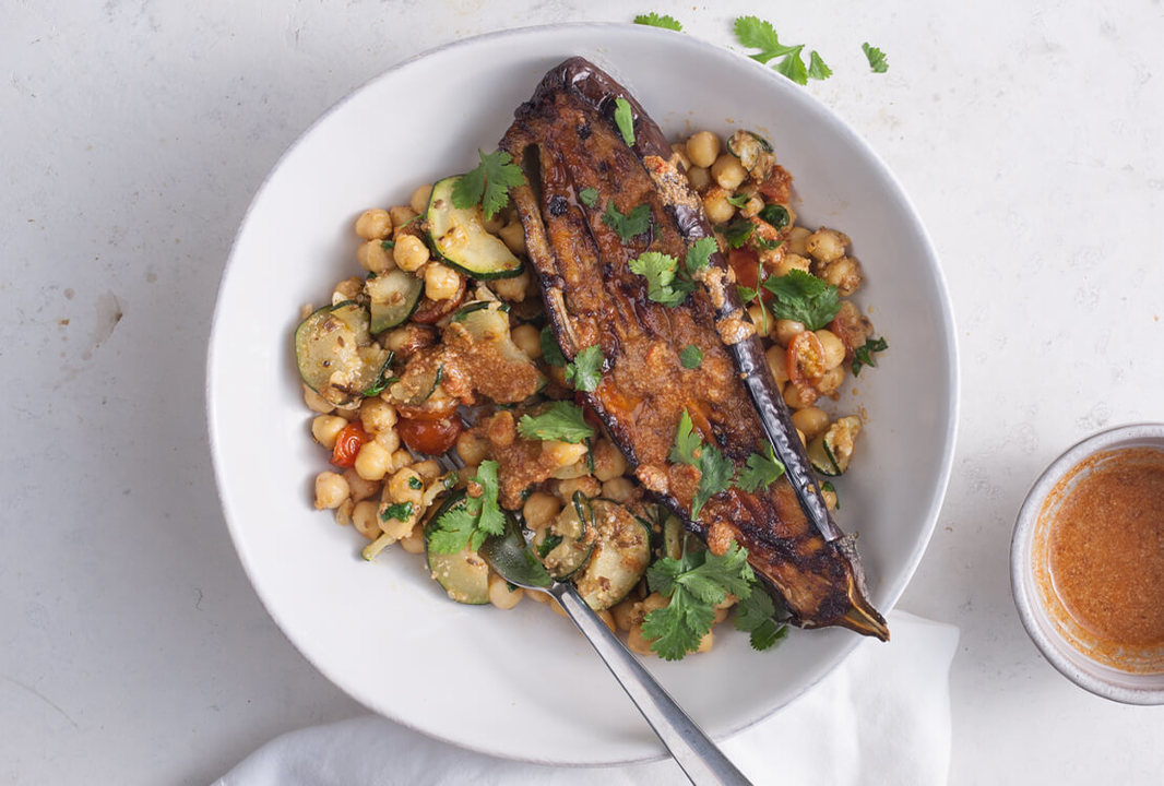 Healthy Vegan recipe Baked harissa aubergine with spiced chickpeas