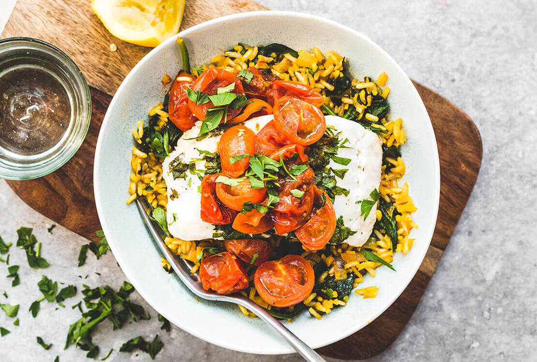 Healthy Fish recipe Cod with lemon risotto & roasted tomatoes